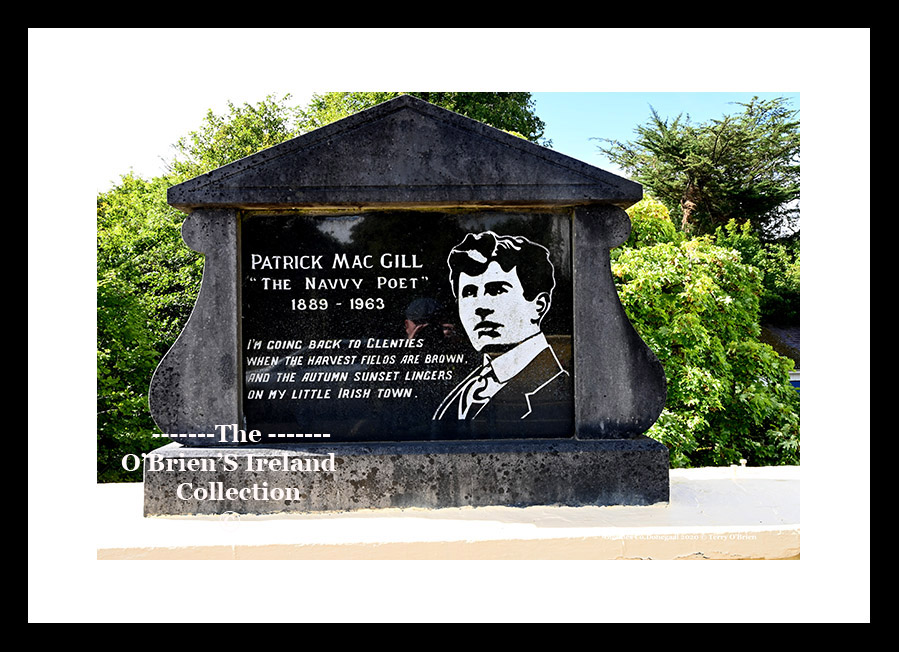 Glenties ~ "Patrick McGill" Monument ~ Glenties commemorates Patrick MacGill (1889-1963), a native of Glenties who was a noted journalist, poet and novelist known as the 'Navvy Post' as he worked as a navvy prior to his career as a writer. An annual literary summer school is held in his honour in Glenties each year. ~ Co. Donegal ....6249
